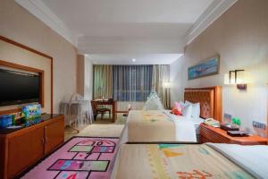 Postel nebo postele na pokoji v ubytování Yihao International Hotel + 263 fotografií