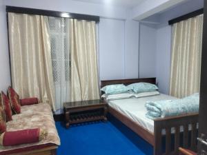 Katil atau katil-katil dalam bilik di Toy Train Homestay