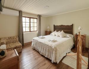 Кровать или кровати в номере Casa Matilde Santa Cruz