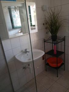 Koupelna v ubytování Apartment Corto