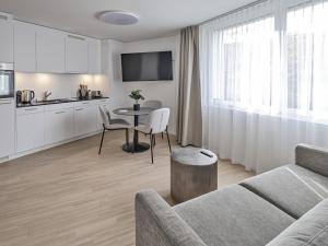 Eldhús eða eldhúskrókur á MOOI Apartments Grenchen
