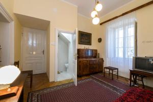 TV a/nebo společenská místnost v ubytování La Vecchia Casa