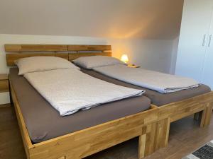 Posteľ alebo postele v izbe v ubytovaní Haus Kampl - Appartement Grundlsee