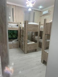 Postel nebo postele na pokoji v ubytování MI Hostel