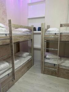 Postel nebo postele na pokoji v ubytování MI Hostel