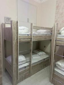Postel nebo postele na pokoji v ubytování MI Hostel