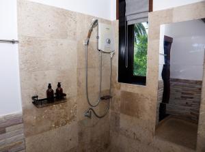 a shower in a bathroom with a shower at Baan Fah Sai in Koh Phangan +53 photos
