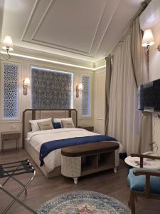 Posteľ alebo postele v izbe v ubytovaní Oasis Inn Budapest