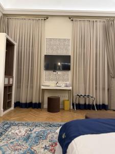 Posteľ alebo postele v izbe v ubytovaní Oasis Inn Budapest