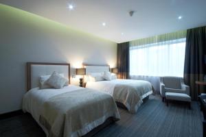 Vuode tai vuoteita majoituspaikassa Rochestown Park Hotel & Leisure Centre