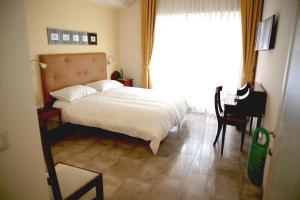 Postel nebo postele na pokoji v ubytování Anice Guesthouse