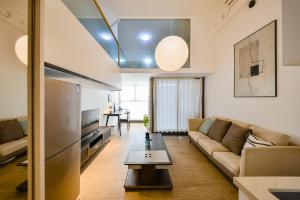 Zona d'estar a Dabaizhijia Executive Apartment Bantian Huawei Branch