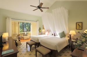 La Veranda Resort Phu Quoc - MGallery客房内的一张或多张床位