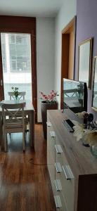 Televízia a/alebo spoločenská miestnosť v ubytovaní Cleopatra Apartment Budapest