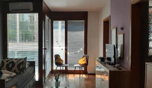 Televízia a/alebo spoločenská miestnosť v ubytovaní Cleopatra Apartment Budapest