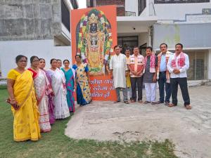 a group of people standing in front of a sign at LD Guest House, Ayodhya in Ayodhya