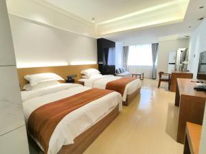 Rúm í herbergi á Chongqing Xiaoshe Yuanmu River View Guesthouse Jiefangbei Hongyadong Branch