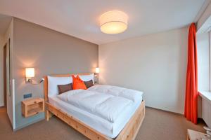 Łóżko lub łóżka w pokoju w obiekcie Hotel Donatz