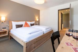 Łóżko lub łóżka w pokoju w obiekcie Hotel Donatz
