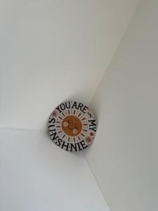 a sticker on the ceiling of a room at Casa Sands in Spittal