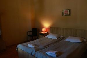 Voodi või voodid majutusasutuse Guesthouse Edena toas