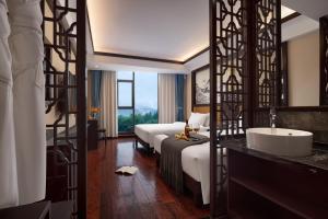 Ancient Dream Hotel客房内的一张或多张床位