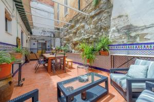 Posezení v ubytování Apartamento con Parking El Patio de La Muralla