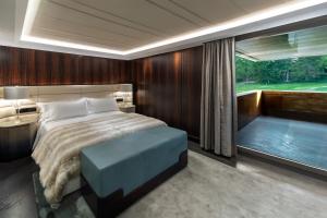 Voodi või voodid majutusasutuse FIVE Zurich - Luxury City Resort toas