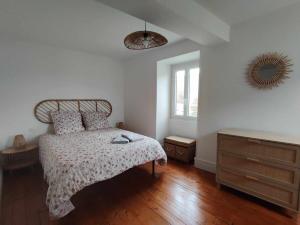 Ένα ή περισσότερα κρεβάτια σε δωμάτιο στο La glycine