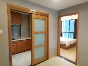 Rúm í herbergi á Chongqing Xiaoshe Yuanmu River View Guesthouse Jiefangbei Hongyadong Branch