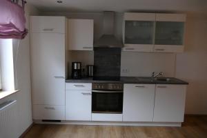 Kuchyň nebo kuchyňský kout v ubytování Ferienwohnung Zur Alten Mühle