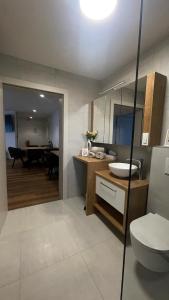 Kuchyň nebo kuchyňský kout v ubytování Apartments Wally