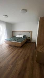 Postel nebo postele na pokoji v ubytování Apartments Wally