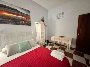 Postel nebo postele na pokoji v ubytování Santa Isabel Low Cost Rooms in private house