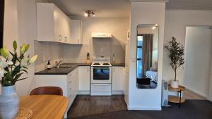 Køkken eller tekøkken på Central QT Retreat + 13 billeder