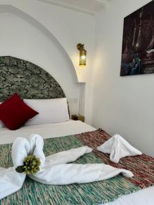 Ένα ή περισσότερα κρεβάτια σε δωμάτιο στο Kasba Green