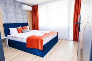Postel nebo postele na pokoji v ubytování Boulevard Hotel