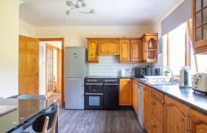 Kuchyň nebo kuchyňský kout v ubytování Quiraing Cottage + 37 fotografií