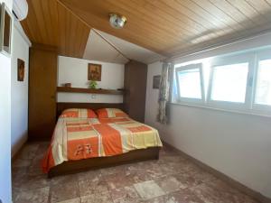 Voodi või voodid majutusasutuse Bed and Breakfast RiB toas