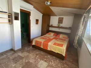Voodi või voodid majutusasutuse Bed and Breakfast RiB toas