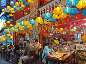 Restaurace v ubytování The Rice Sen Ốc 191 - 226 Bùi Viện