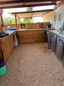 A kitchen or kitchenette at Eco Glamping with Pool between Nafplio and Argos