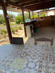 A balcony or terrace at Eco Glamping with Pool between Nafplio and Argos