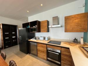Kjøkken eller kjøkkenkrok på Blue Ocean Suites & Apartments