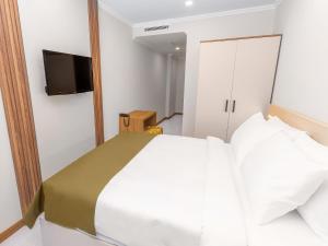 TV a/nebo společenská místnost v ubytování Quinnova Hotel