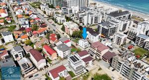 an aerial view of a city with buildings and the ocean at Mida Summer Villa in Mamaia Sat/Năvodari