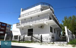 a white building with balconies on top of it at Mida Summer Villa in Mamaia Sat/Năvodari