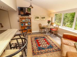 Χώρος καθιστικού στο Kirkland Howe Cottage