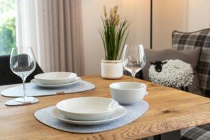 Posezení v ubytování Ferienhaus Lüttje Steern 5 Sterne