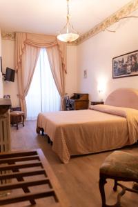 TV a/nebo společenská místnost v ubytování Hotel Belvedere
